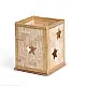 handcrafted square bamboo tea light holders featuring a cutout star and a cutout christmas tree panel with woven gold ribbon borders