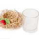 handcrafted natural bamboo fiber frill tea light holder with red and green crochet flower accents holding a clear glass candle cup on a festive display table