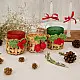 handcrafted banana bark woven tea light holders with green and red crochet holly berry accents holding colored glass candle cups on a festive table display