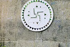 Home And Living | Handmade ~ Kutch Lippan Mud Work Swastik symbol - white