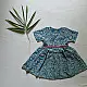 blue pure cotton girls frock with floral print pink piping and embroidered details