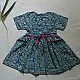 blue pure cotton girls frock with floral print pink piping and embroidered details