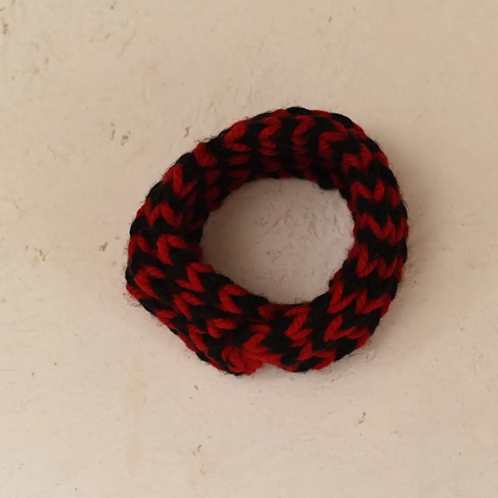 black red hand knitted himalayan woolen socks textured geometric pattern matching red black flower hairband winter foot warmers gaatha