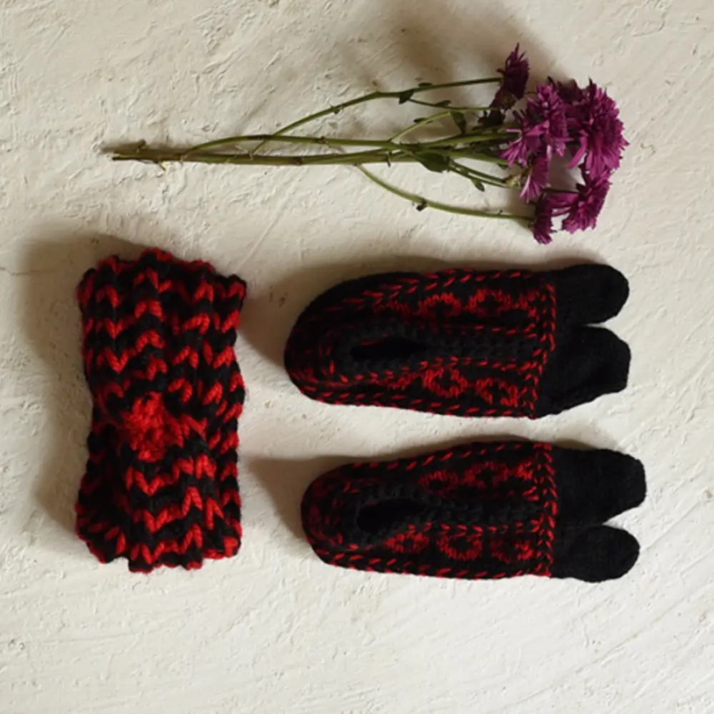 black red hand knitted himalayan woolen socks textured geometric pattern matching red black flower hairband winter foot warmers gaatha