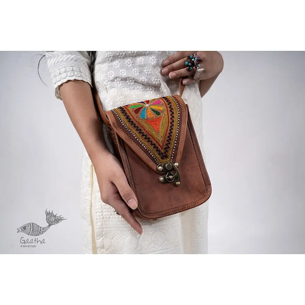 online embroidered leather hand bag