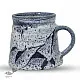 handmade studio ceramic coffee mugs set of two in light blue and white glaze with hand painted botanical leaf motifs