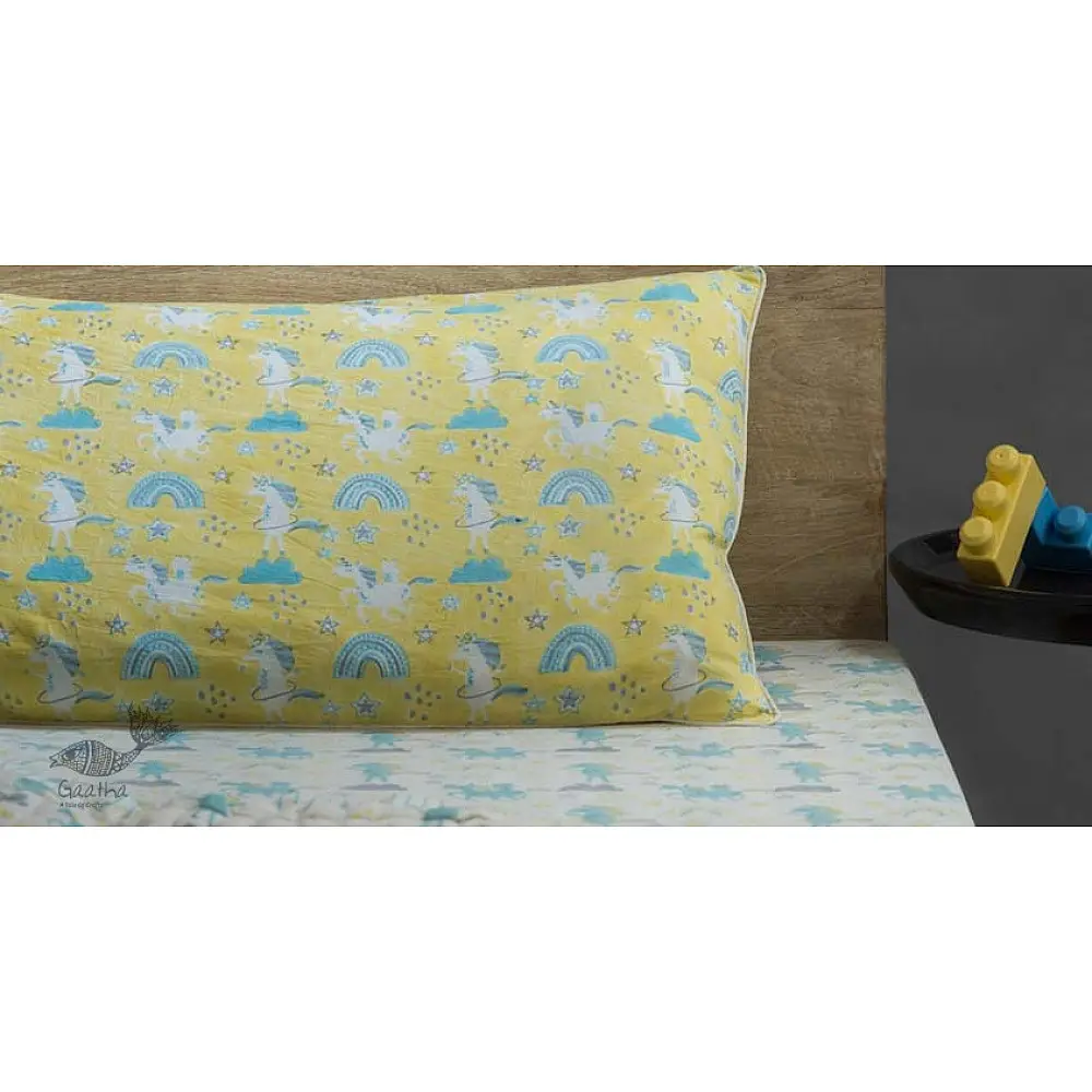 blueberry blue and yellow block printed baby bedding set with dancing unicorns pattern including pillowcase and bedsheet