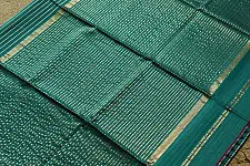 Pavitra . Handloom Maheshwari Silk Saree | Kosa Stripe + Zari | bottle green