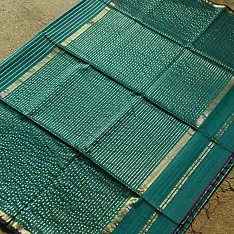 Pavitra . Handloom Maheshwari Silk Saree | Kosa Stripe + Zari | bottle green