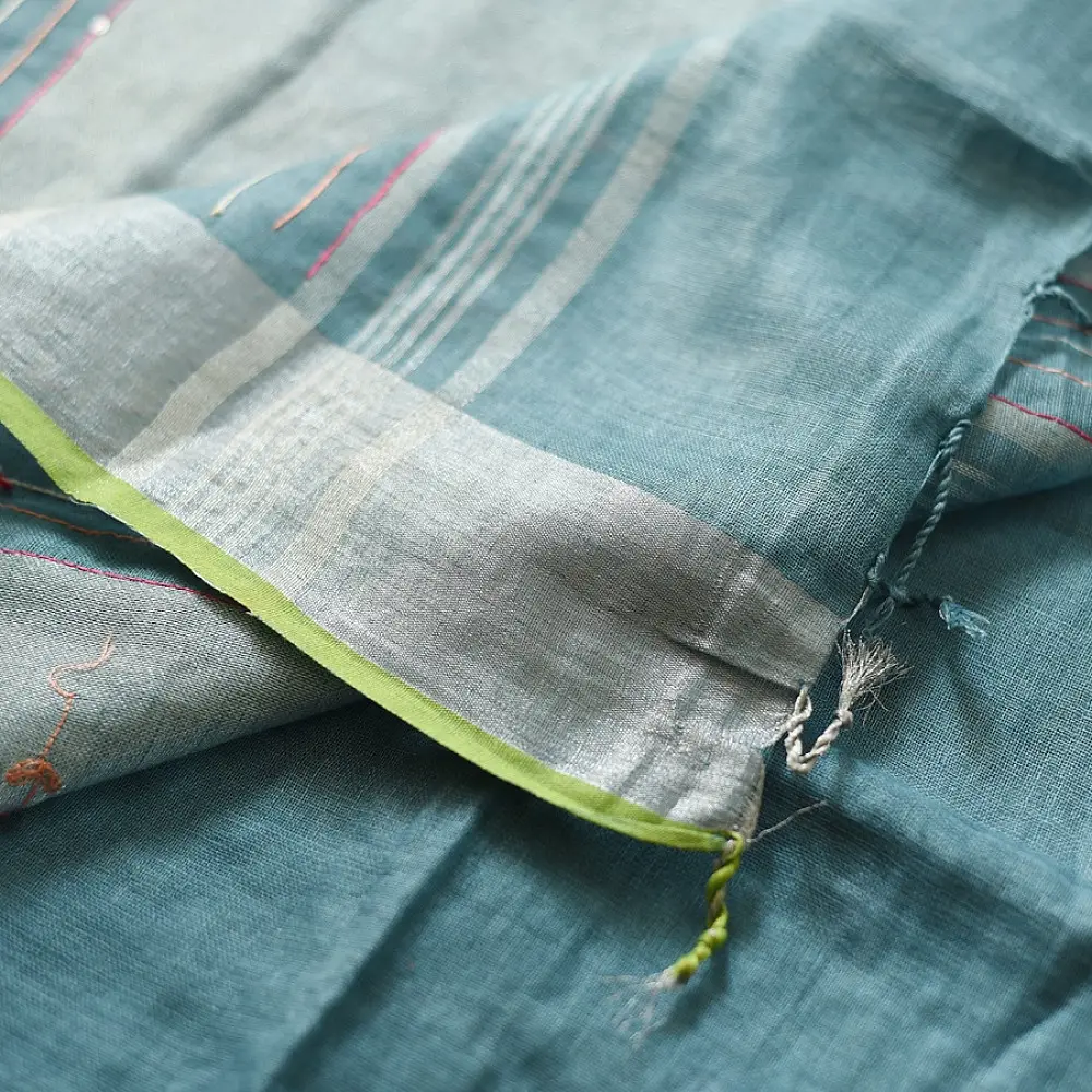 handloom pure linen sea green saree with striped palla subtle grid pattern delicate hand embroidery and tasselled pallu