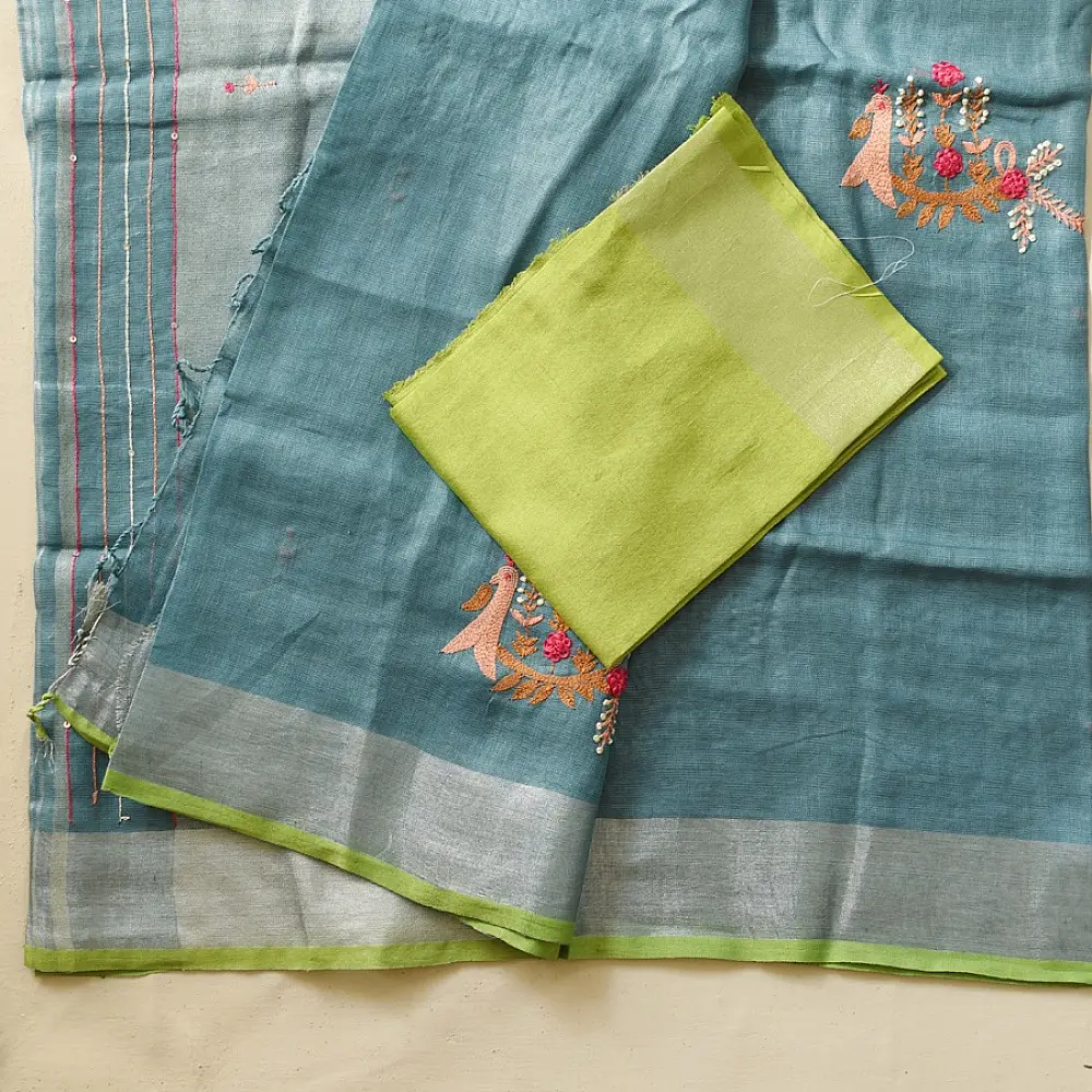 handloom pure linen sea green saree with striped palla subtle grid pattern delicate hand embroidery and tasselled pallu