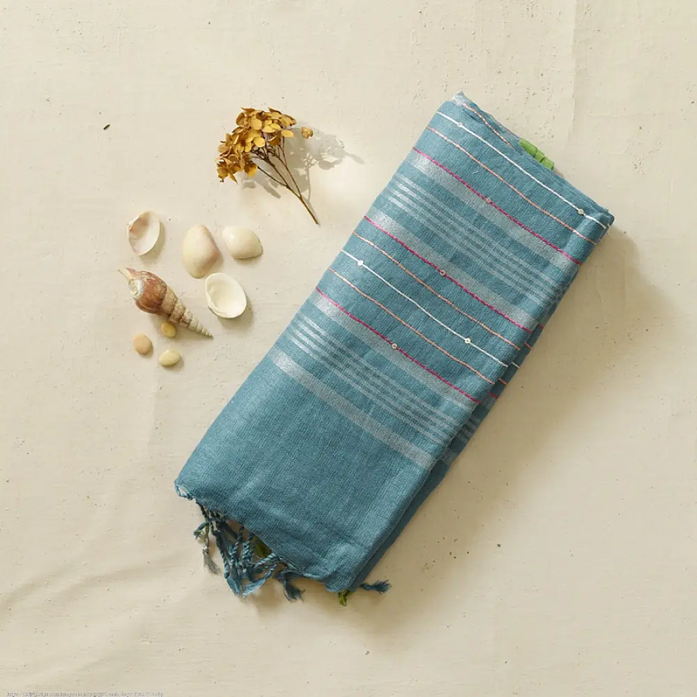 handloom pure linen sea green saree with striped palla subtle grid pattern delicate hand embroidery and tasselled pallu
