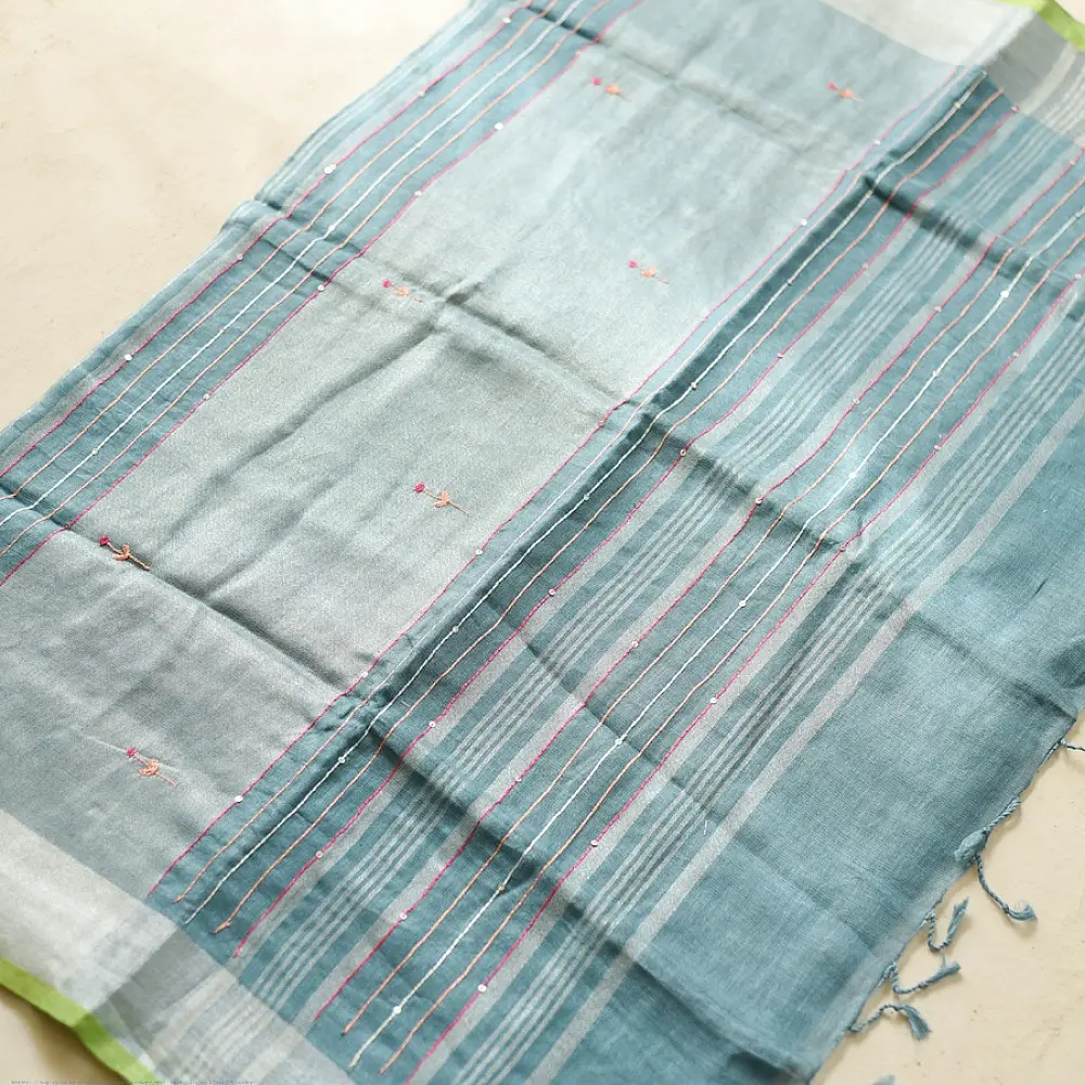handloom pure linen sea green saree with striped palla subtle grid pattern delicate hand embroidery and tasselled pallu