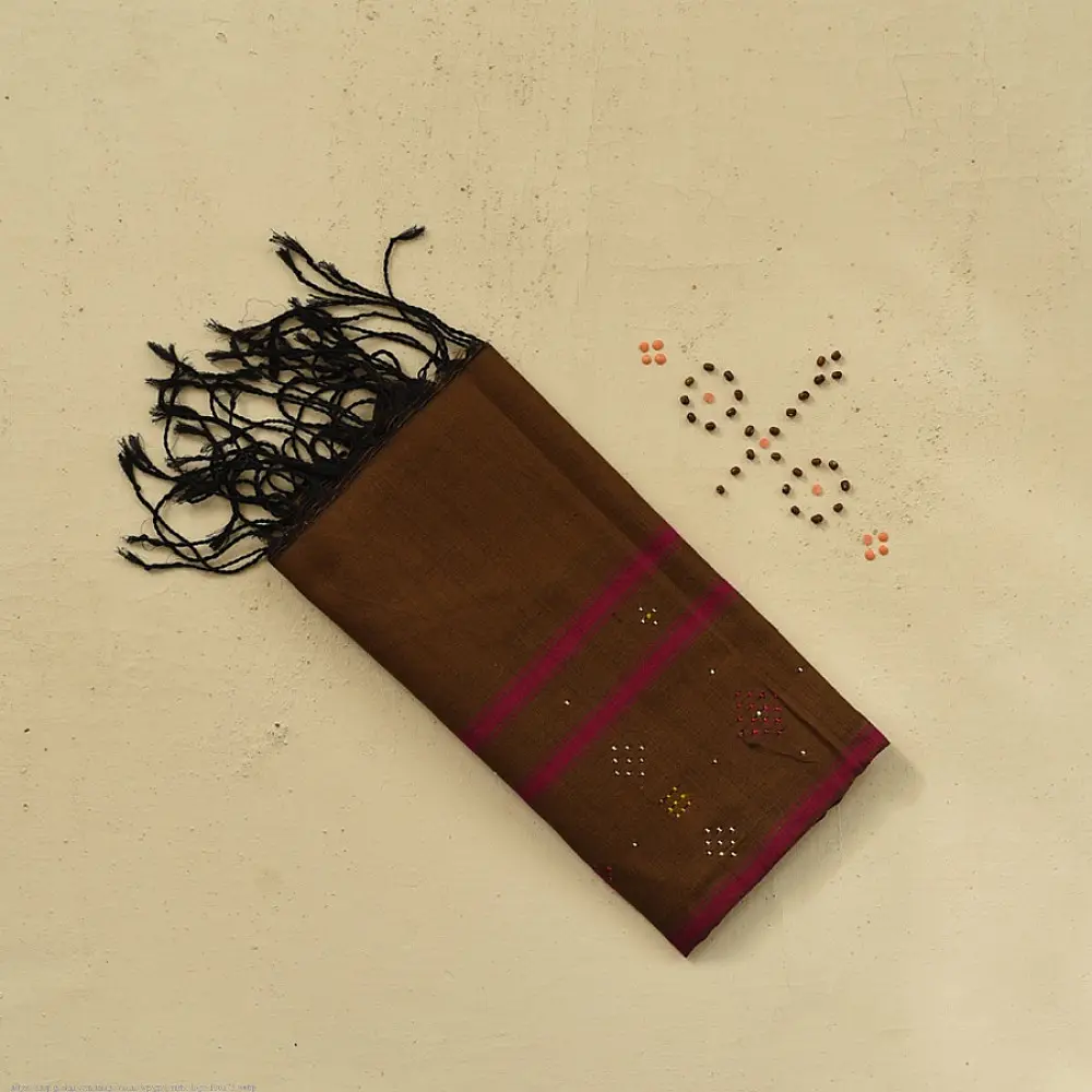 tangaliya handloom cotton stole in earthy olive brown with magenta pink stripes, white and yellow raised dana bead motifs, and hand-knotted fringe tassels   