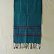 tangaliya handloom cotton stole in ocean teal blue with maroon red stripes, yellow and white raised dana bead motifs, and hand-knotted fringe tassels