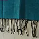 tangaliya handloom cotton stole in ocean teal blue with maroon red stripes, yellow and white raised dana bead motifs, and hand-knotted fringe tassels