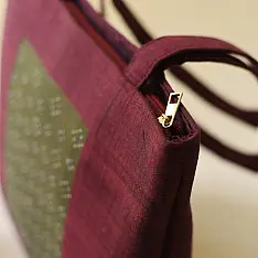 Dots & weaves ~ Tangaliya Shoulder Bag | Maroon & Green 