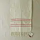 tangaliya handloom cotton stole in natural off-white cream with fine red pinstripes, yellow and red raised dana dot motifs, and fringe tassels