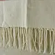 tangaliya handloom cotton stole in natural off-white cream with fine red pinstripes, yellow and red raised dana dot motifs, and fringe tassels