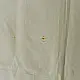 tangaliya handloom cotton stole in natural off-white cream with fine red pinstripes, yellow and red raised dana dot motifs, and fringe tassels