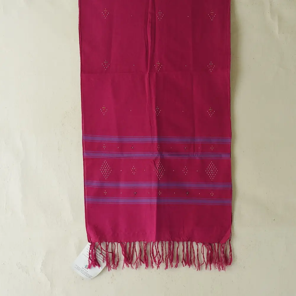 tangaliya handloom cotton stole in vibrant rani pink with indigo blue stripes, white raised dana bead motifs, and hand-knotted fringe tassels