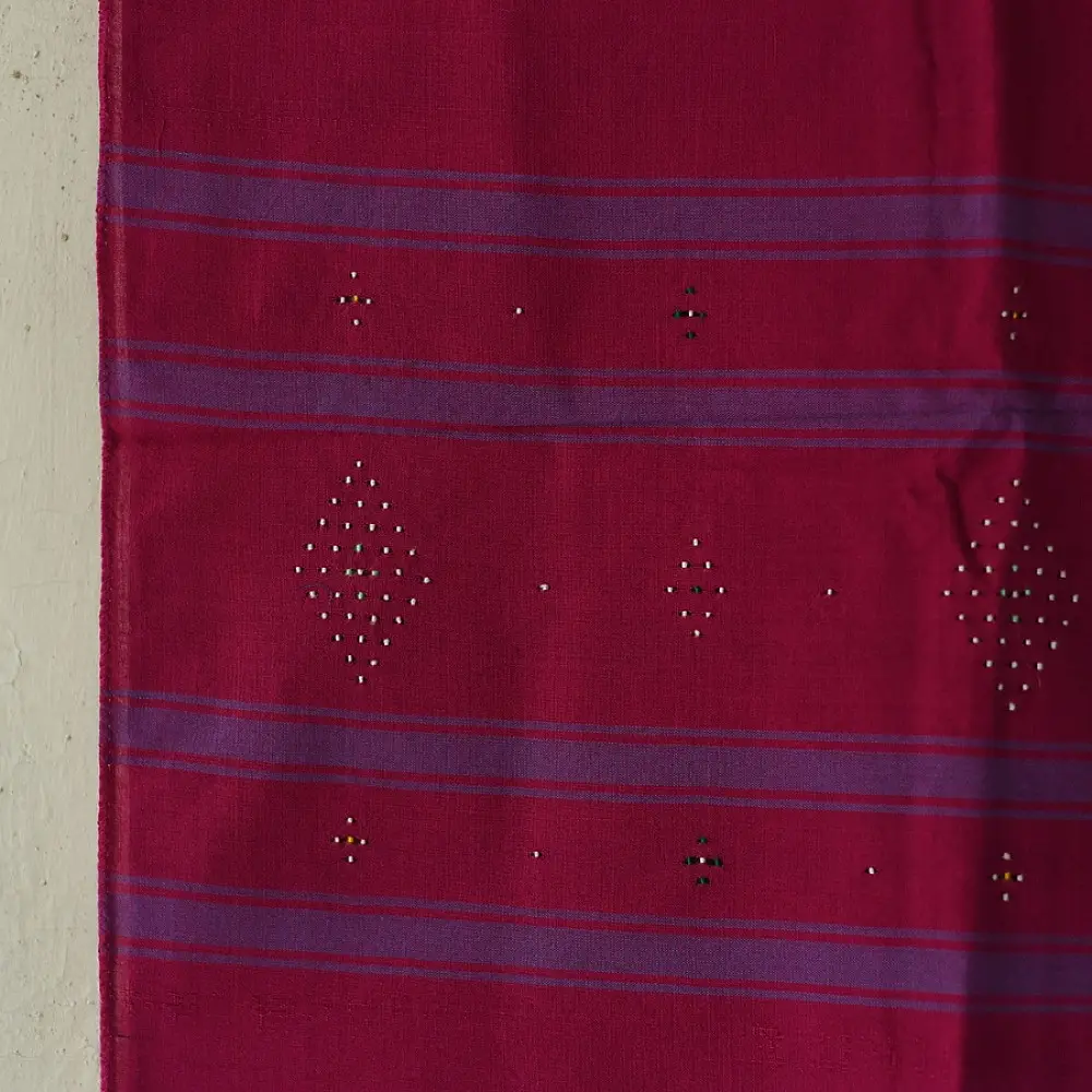 tangaliya handloom cotton stole in vibrant rani pink with indigo blue stripes, white raised dana bead motifs, and hand-knotted fringe tassels