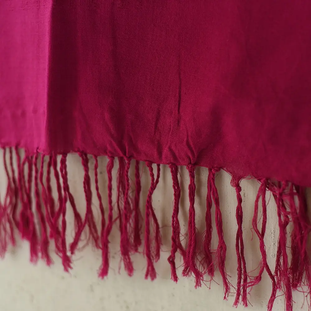 tangaliya handloom cotton stole in vibrant rani pink with indigo blue stripes, white raised dana bead motifs, and hand-knotted fringe tassels