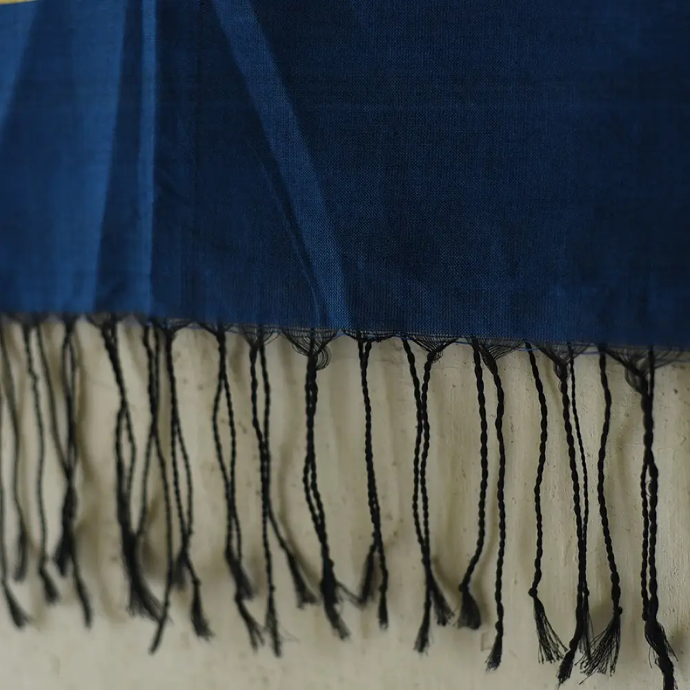 tangaliya handloom cotton stole in deep indigo blue with mustard yellow stripes, raised white dana dot motifs, and hand-knotted fringe tassels