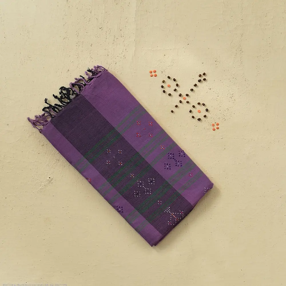 tangaliya handloom cotton stole with purple and dark charcoal vertical stripes, green and white raised dana dotwork motifs, and hand-knotted fringe tassels
