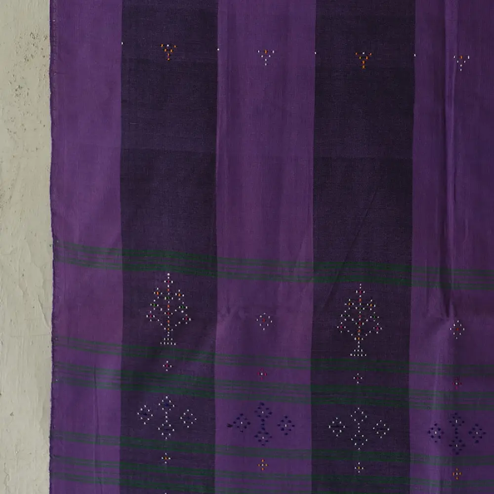 tangaliya handloom cotton stole with purple and dark charcoal vertical stripes, green and white raised dana dotwork motifs, and hand-knotted fringe tassels