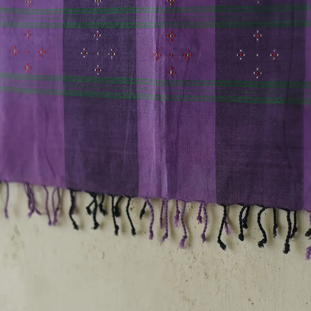 tangaliya handloom cotton stole with purple and dark charcoal vertical stripes, green and white raised dana dotwork motifs, and hand-knotted fringe tassels