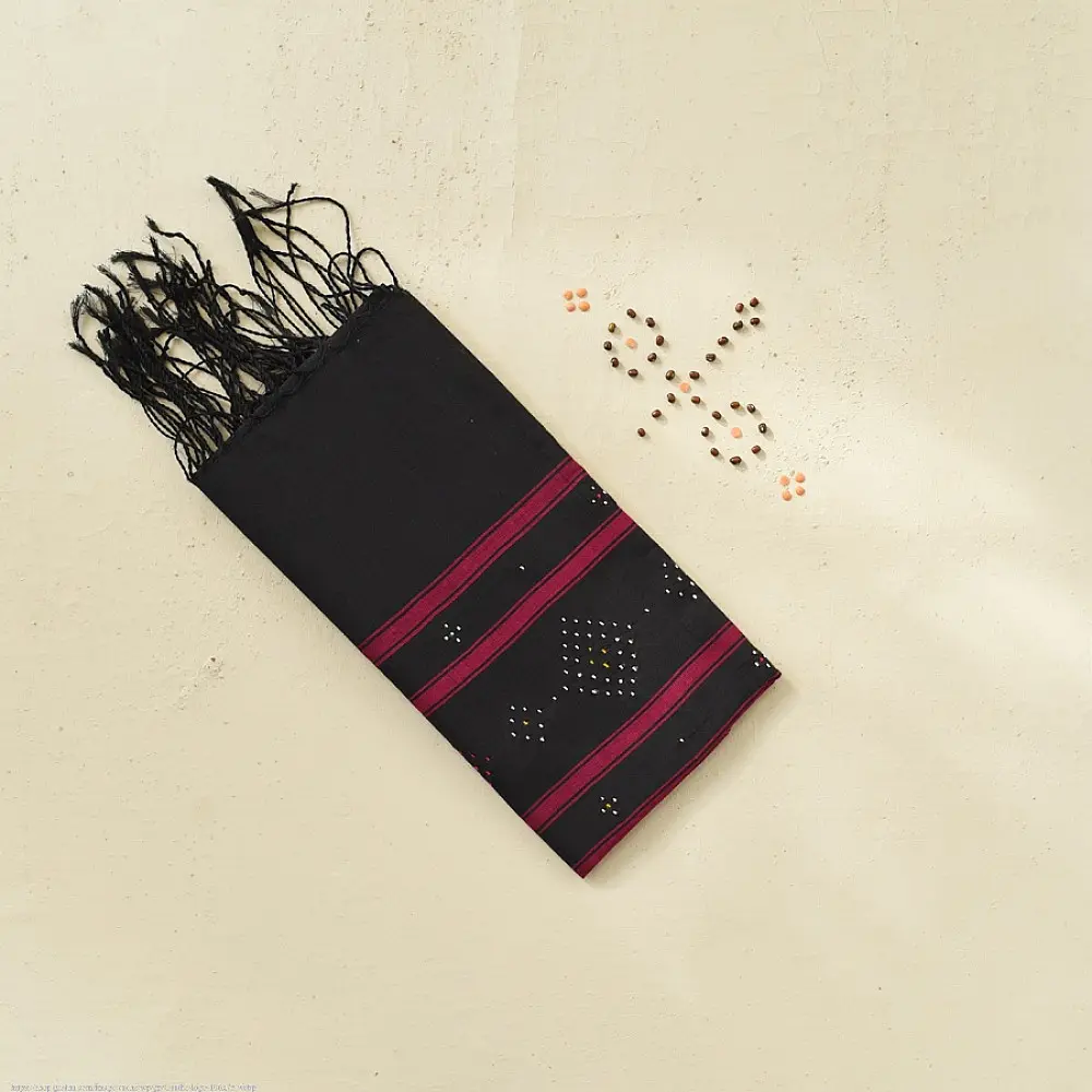 tangaliya handloom cotton stole in charcoal black with maroon stripes, white raised dana bead motif, and hand-knotted fringe tassels
