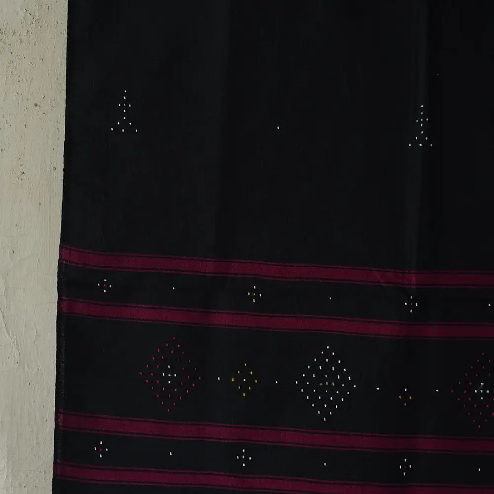 tangaliya handloom cotton stole in charcoal black with maroon stripes, white raised dana bead motif, and hand-knotted fringe tassels
