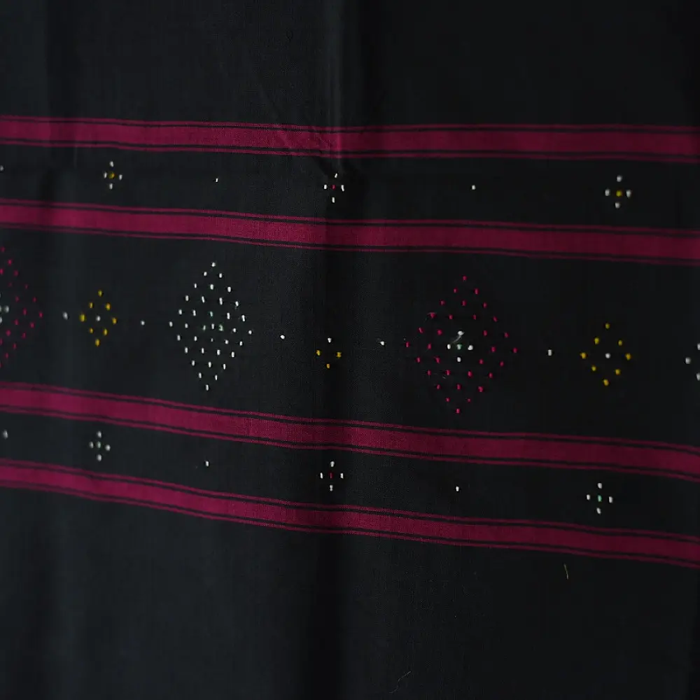 tangaliya handloom cotton stole in charcoal black with maroon stripes, white raised dana bead motif, and hand-knotted fringe tassels