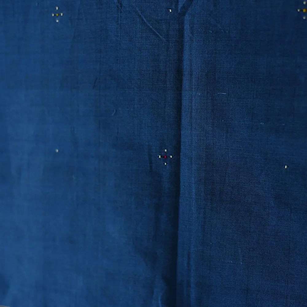 tangaliya handloom cotton stole in indigo royal blue with mustard yellow stripes, hand-woven white dana dot motifs, and knotted fringe tassels