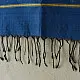 tangaliya handloom cotton stole in indigo royal blue with mustard yellow stripes, hand-woven white dana dot motifs, and knotted fringe tassels