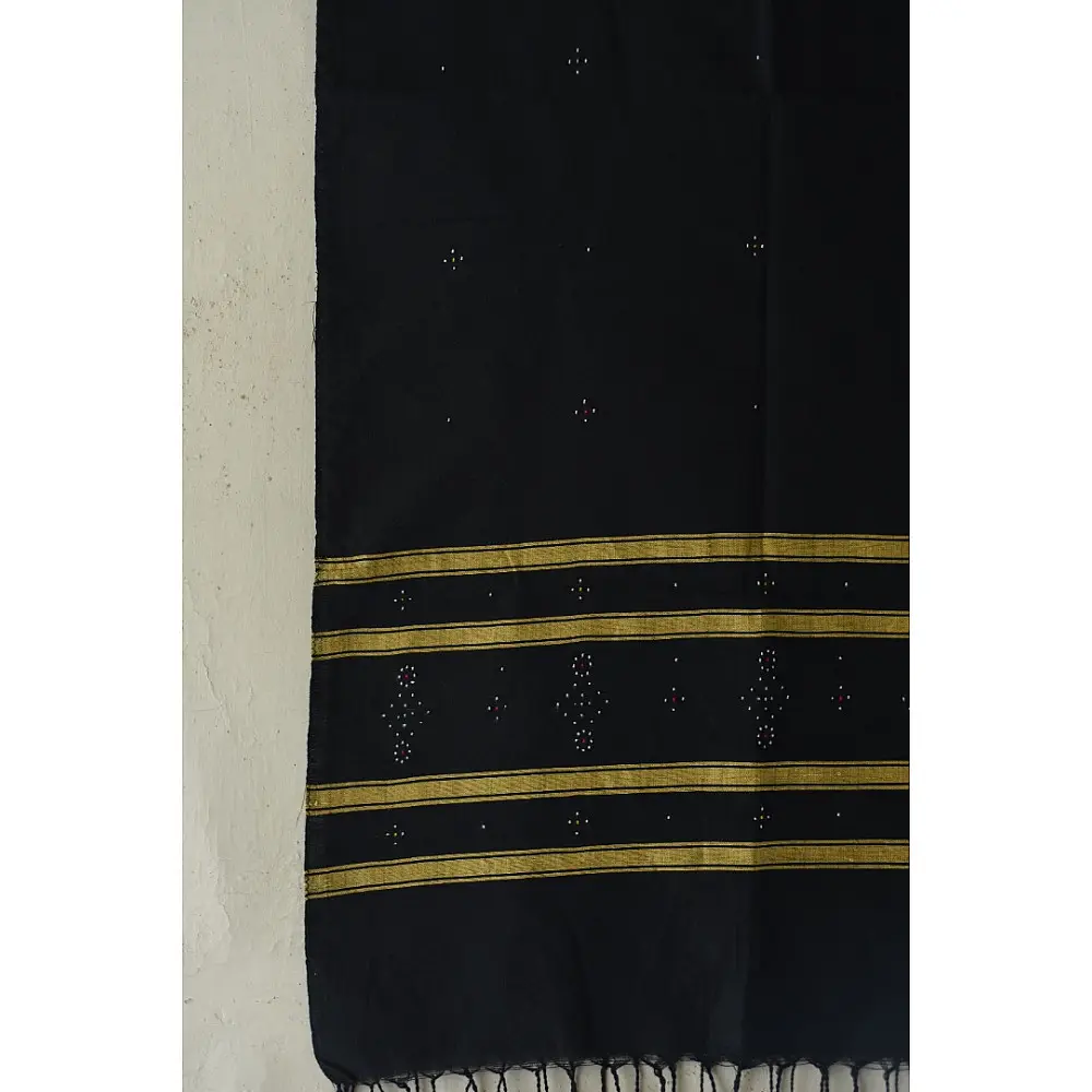 tangaliya handloom cotton stole in jet black, raised white and terracotta dana dots, and hand-knotted fringe tassels