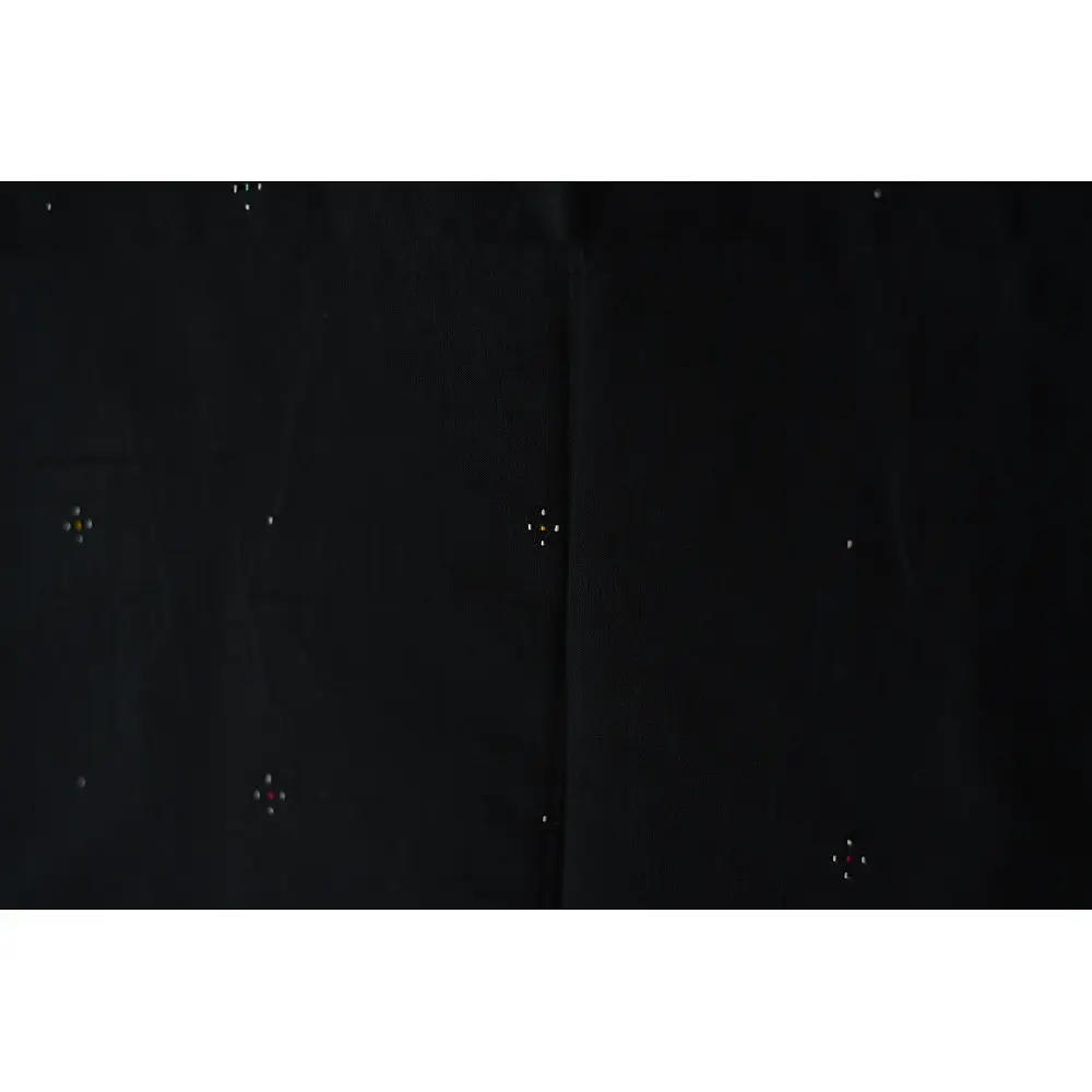 tangaliya handloom cotton stole in jet black, raised white and terracotta dana dots, and hand-knotted fringe tassels