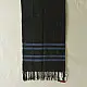 tangaliya handloom cotton stole in classic black with subtle indigo blue stripes, raised white dana dotwork motifs, and hand-knotted tassels   