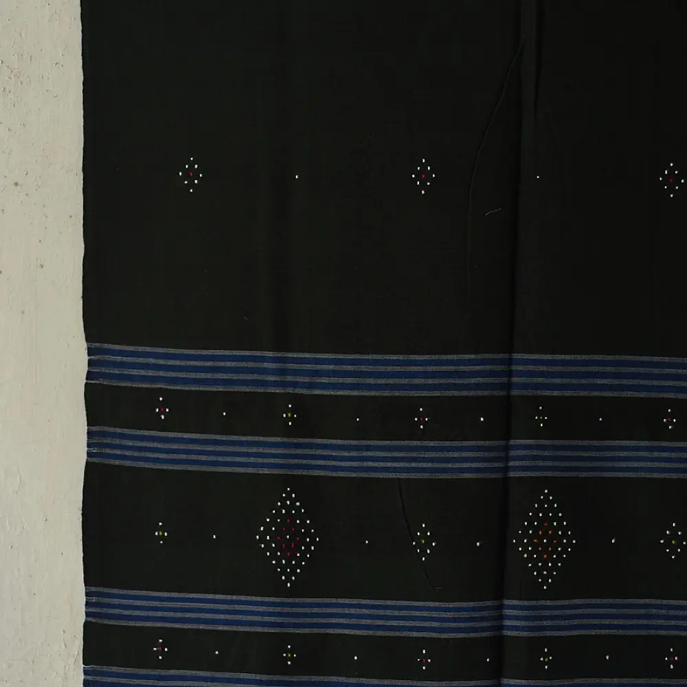 tangaliya handloom cotton stole in classic black with subtle indigo blue stripes, raised white dana dotwork motifs, and hand-knotted tassels   