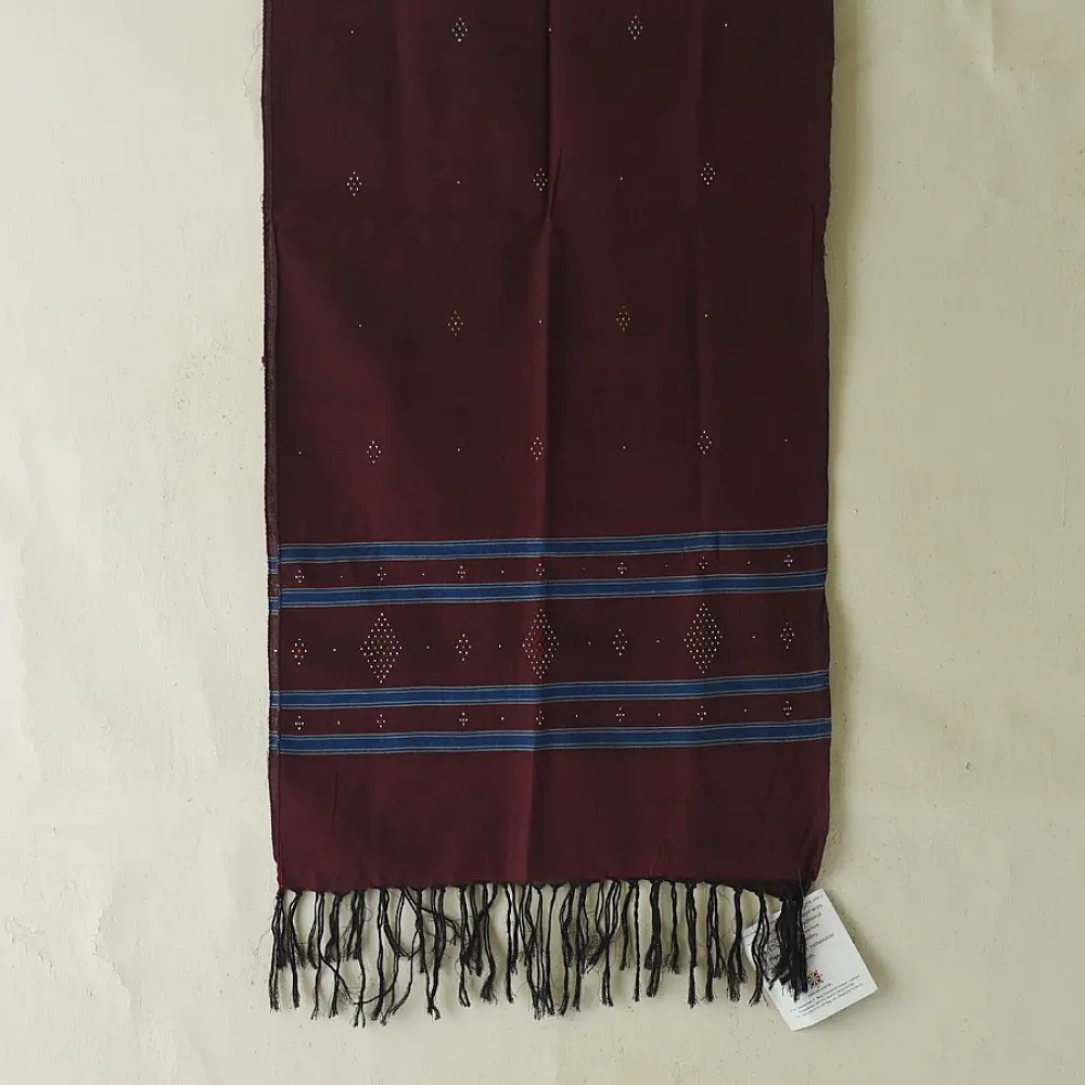 tangaliya handloom cotton stole in deep wine maroon with teal blue stripes, white raised dana bead motifs, and hand-knotted fringe tassels