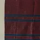 tangaliya handloom cotton stole in classic black with subtle indigo blue stripes, raised white dana dotwork motifs, and hand-knotted tassels   