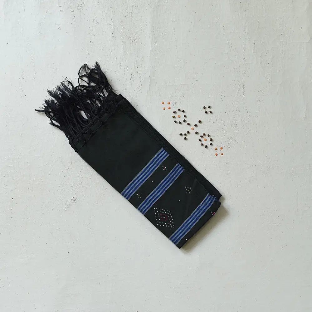 tangaliya handloom cotton stole in dark green with sky blue stripes, raised white dana dot motifs, and hand-knotted fringe tassels