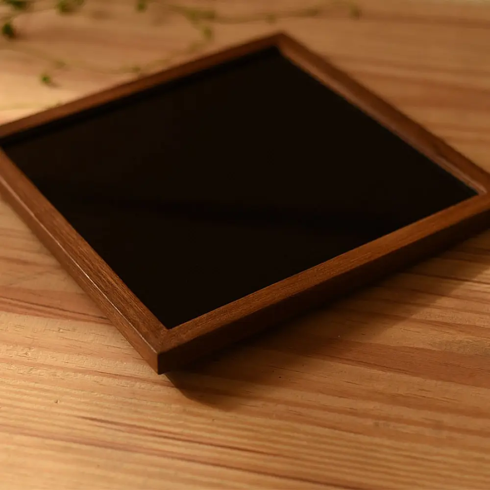 handmade wooden tray with orange soof embroidered fabric and star motif