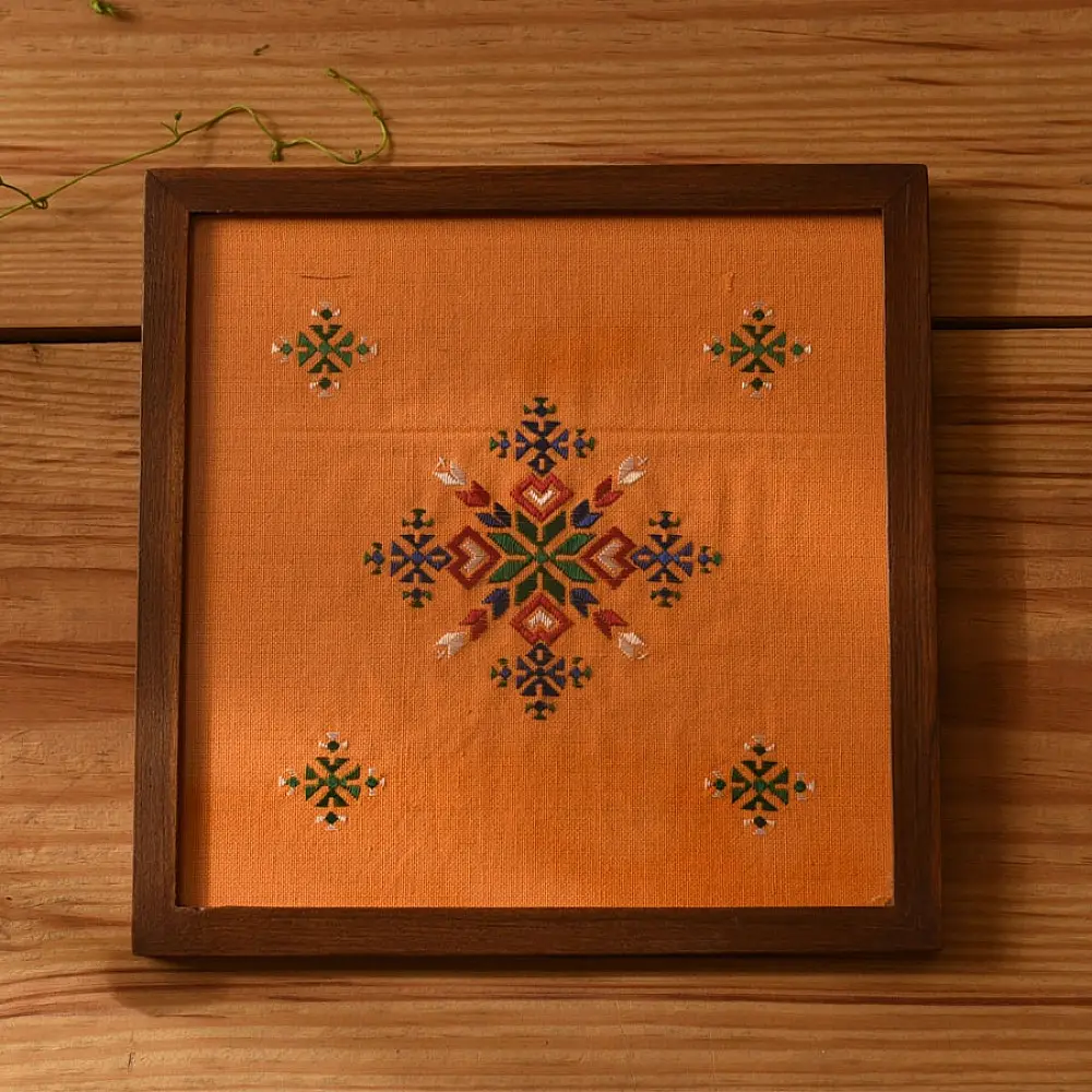 handmade wooden tray with orange soof embroidered fabric and star motif