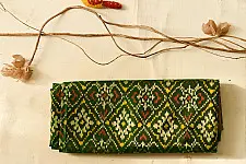 चंपा - चकली ⁂ Handwoven Patola Silk Saree | Green