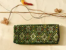 चंपा - चकली ⁂ Handwoven Patola Silk Saree | Green