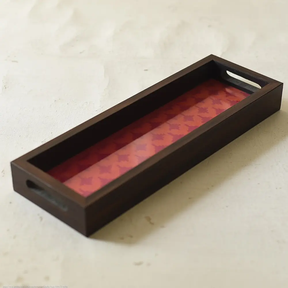 handmade wooden tray with pink patola silk print and cutout handle