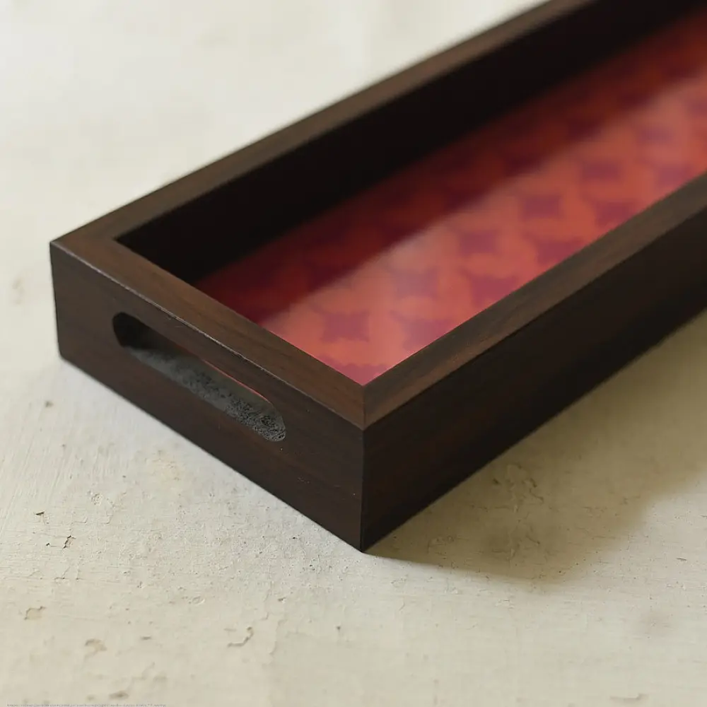 handmade wooden tray with pink patola silk print and cutout handle