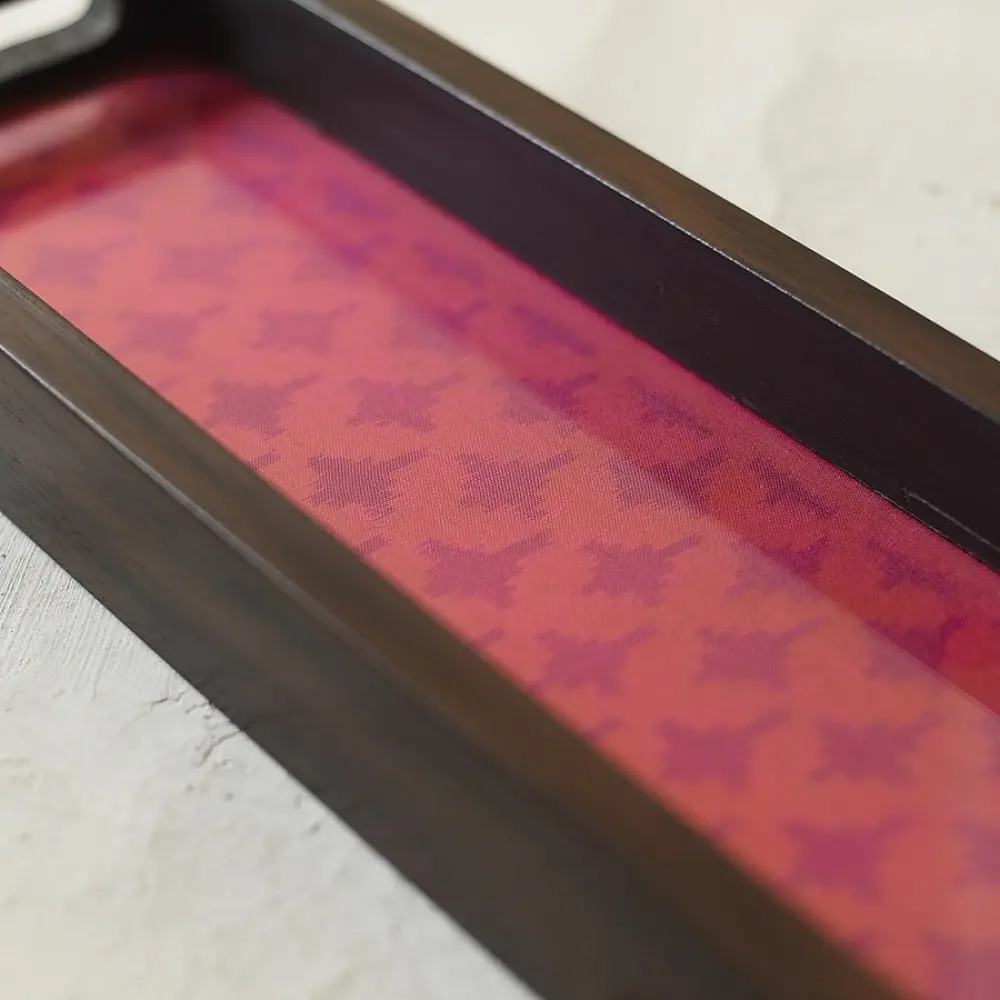 handmade wooden tray with pink patola silk print and cutout handle